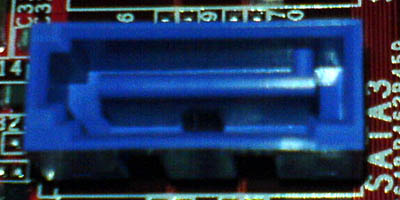 Photo view of 7 pin Serial ATA motheboard internal connector